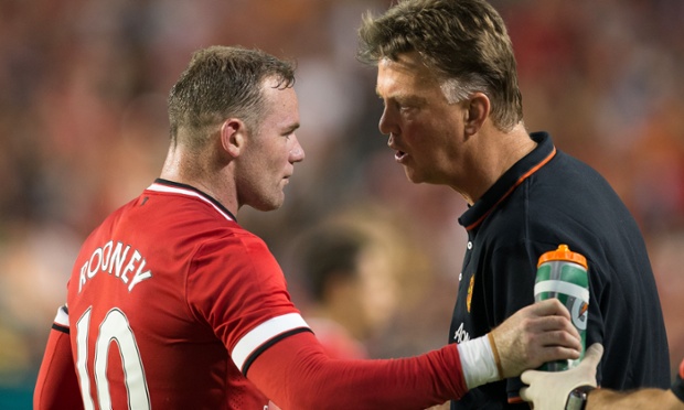 04 Aug 2014, Miami, Florida, USA --- Manchester United Head Coach Louis Van Gaal has a word with Captain Wayne Rooney (10) during Soccer, 2014 Guinness International Champions Cup Championship Match, between Manchester United and Liverpool on August 04, 2014 at Sun Life Stadium, Miami, FL, USA. Manchester United won the match with a score of 3-1. Photo © Ira L. Black --- Image by © Ira L. Black/Ira L. Black Photography/Corbis